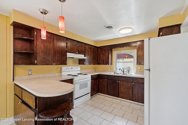 kitchen with open shelves, a sink, light countertops, under cabinet range hood, and white appliances