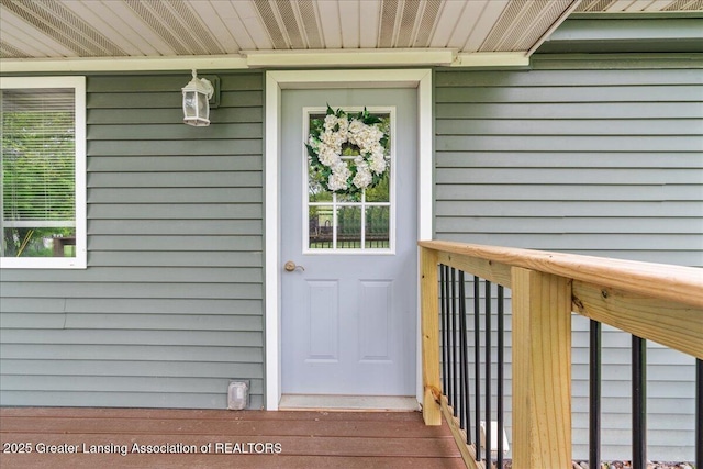6239 S Clinton Trl, Eaton Rapids, MI 48827 - view of exterior entry with covered porch
