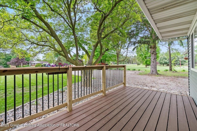 6239 S Clinton Trl, Eaton Rapids, MI 48827 - wooden terrace with a lawn