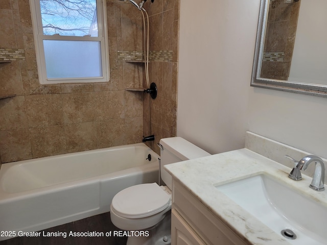 bathroom with vanity, toilet, and bathing tub / shower combination