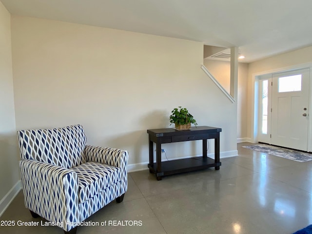 2491 W Price Rd, Saint Johns, MI 48879 - entrance foyer featuring concrete floors, baseboards, and recessed lighting