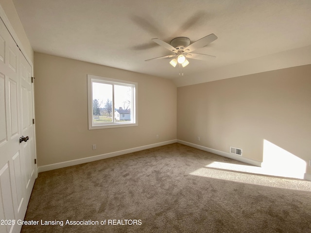 2491 W Price Rd, Saint Johns, MI 48879 - unfurnished bedroom with carpet flooring, visible vents, a closet, and baseboards