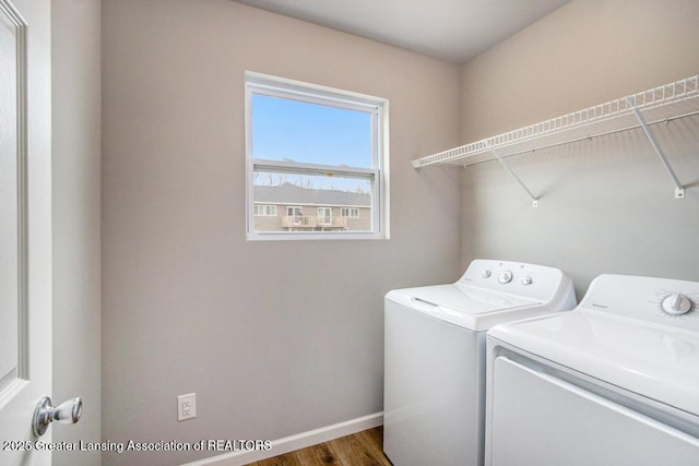 1060 Woodridge Dr, Saint Johns, MI 48879 - laundry room featuring independent washer and dryer, wood finished floors, and baseboards