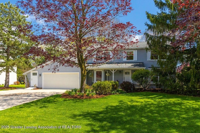 traditional-style house with concrete driveway, a garage, and a front lawn