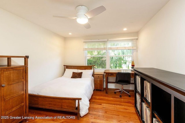 bedroom with light wood finished floors, ceiling fan, and recessed lighting