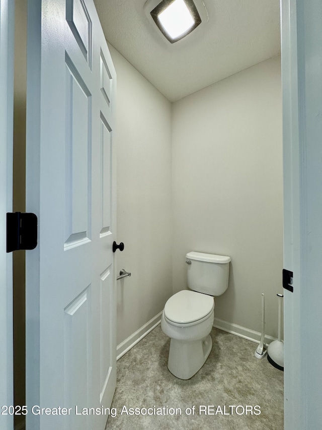 2632 Carnoustie Dr, Okemos, MI 48864 - bathroom featuring toilet and baseboards