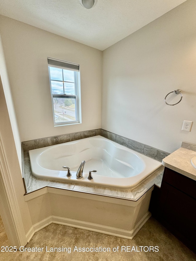 2632 Carnoustie Dr, Okemos, MI 48864 - bathroom featuring vanity and a bath