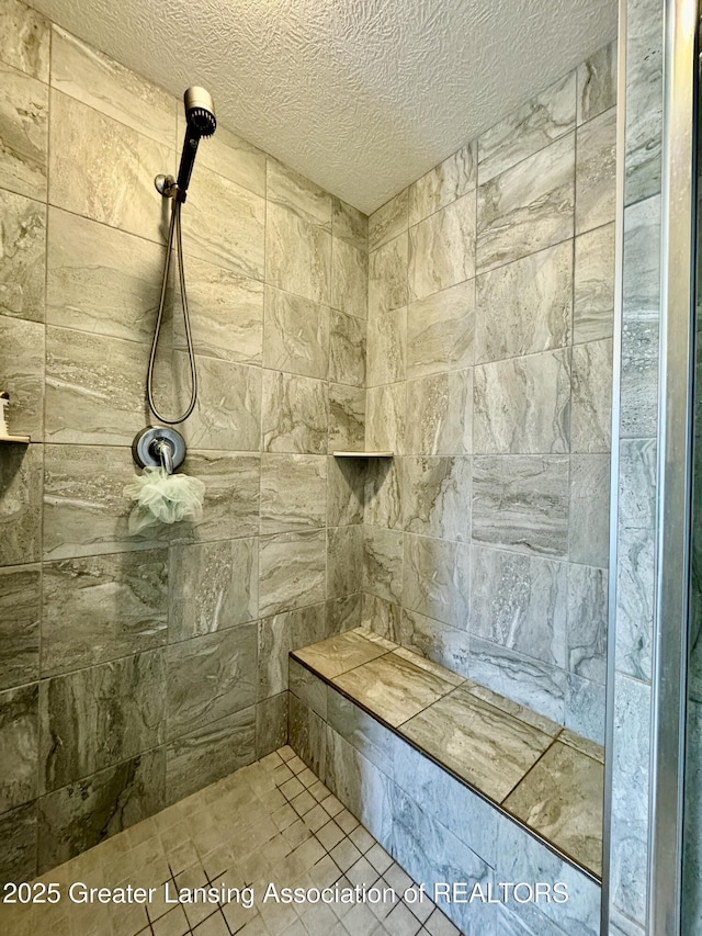 2632 Carnoustie Dr, Okemos, MI 48864 - full bath with a textured ceiling and tiled shower