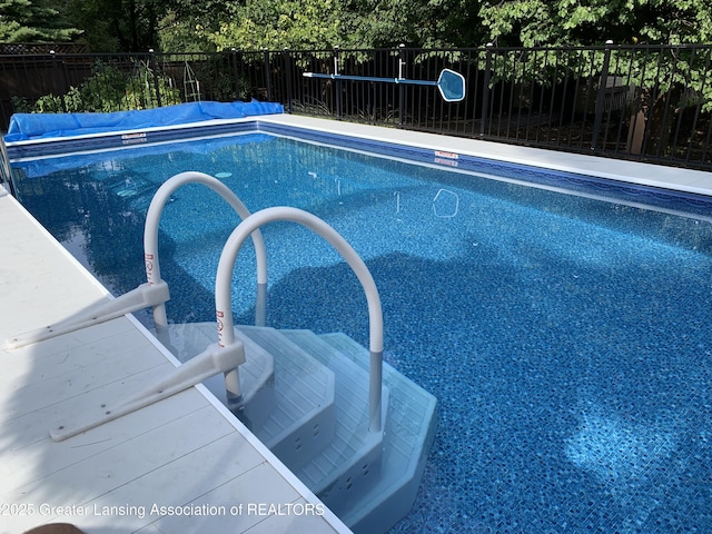 1970 Hollowbrook Dr, Holt, MI 48842 - view of swimming pool with a fenced in pool and fence