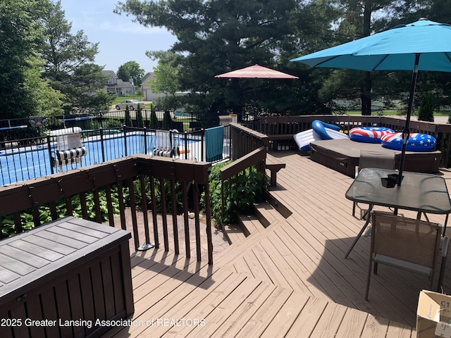 1970 Hollowbrook Dr, Holt, MI 48842 - wooden deck with outdoor lounge area and fence