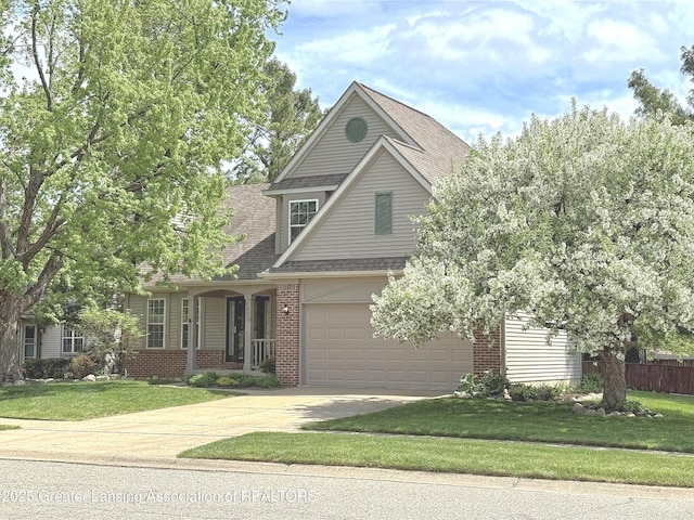 1970 Hollowbrook Dr, Holt, MI 48842 - view of front of property featuring fence, a shingled roof, driveway, and brick siding