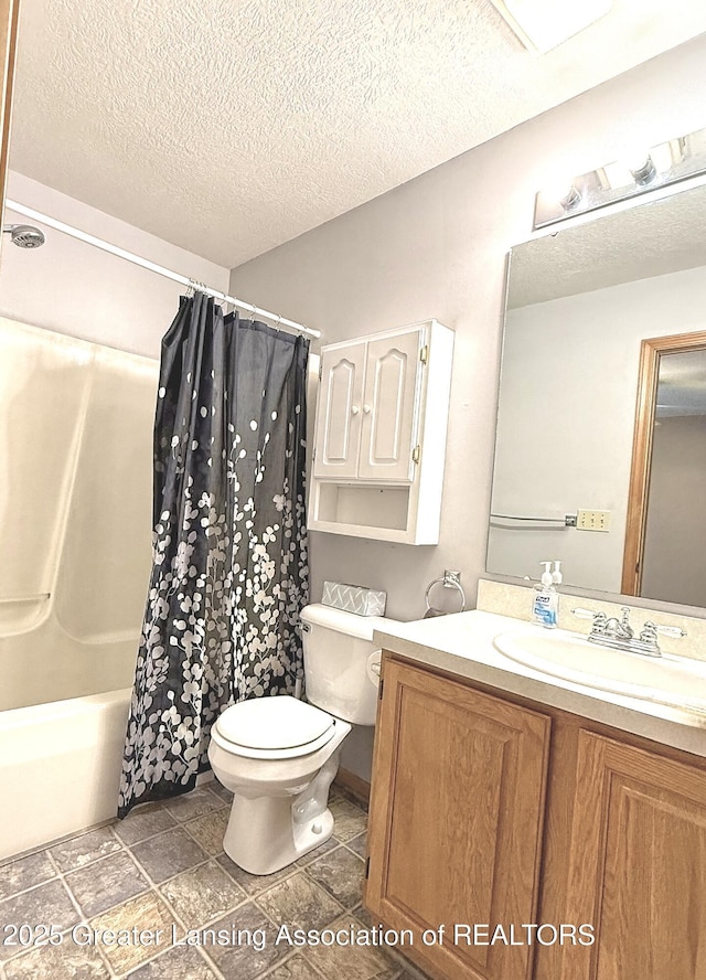 1970 Hollowbrook Dr, Holt, MI 48842 - full bath with vanity, toilet, a textured ceiling, shower / bathtub combination with curtain, and stone finish flooring
