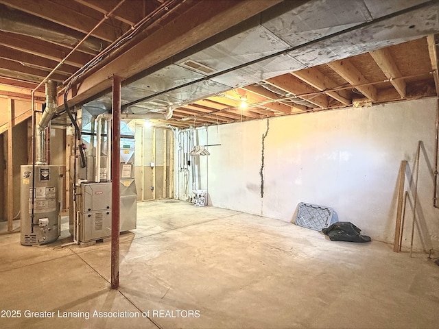 1970 Hollowbrook Dr, Holt, MI 48842 - unfinished below grade area with heating unit and water heater