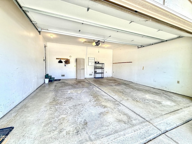 1970 Hollowbrook Dr, Holt, MI 48842 - garage with a garage door opener
