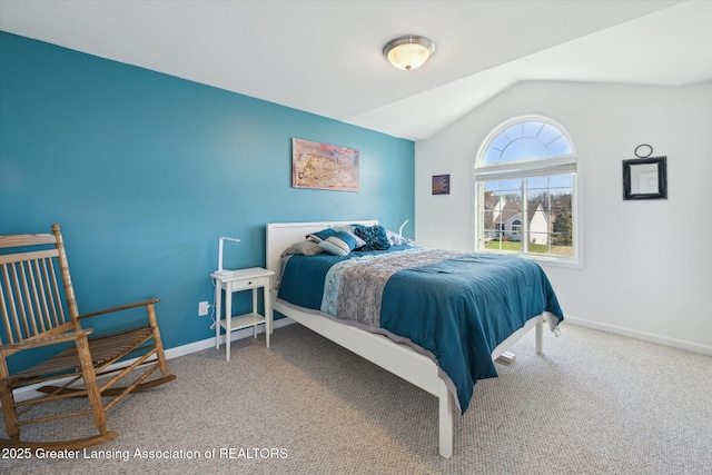 14178 Mulholland Dr, Bath, MI 48808 - bedroom featuring lofted ceiling, carpet flooring, and baseboards