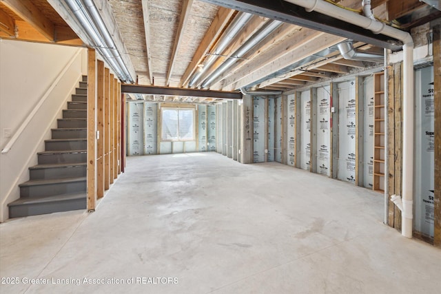 14178 Mulholland Dr, Bath, MI 48808 - basement featuring stairway