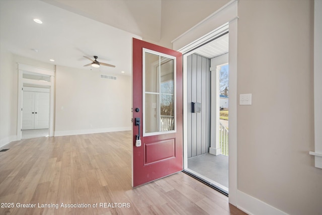 foyer featuring ceiling fan, visible vents, recessed lighting, light wood finished floors, and baseboards