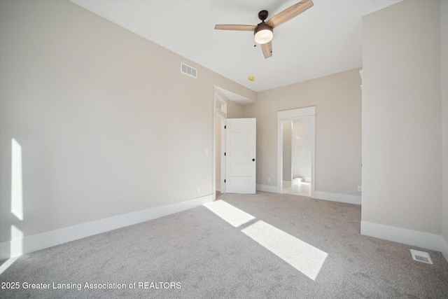 unfurnished bedroom featuring baseboards, visible vents, and carpet floors
