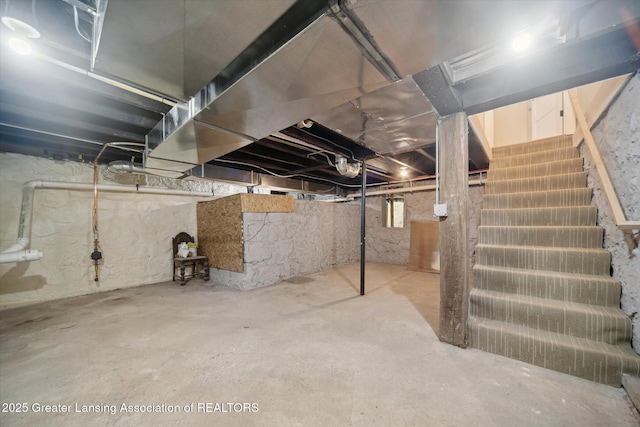 basement featuring stairway