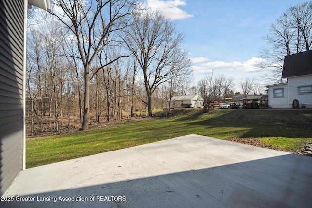 view of yard with a patio area