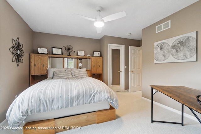 5810 Caleta Dr, Lansing, MI 48911 - bedroom featuring carpet flooring, baseboards, and a ceiling fan