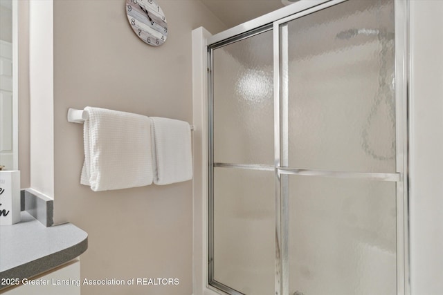5810 Caleta Dr, Lansing, MI 48911 - full bathroom featuring a stall shower and vanity