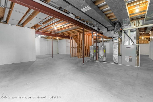 4345 Courtside Dr, Williamston, MI 48895 - unfinished below grade area with water heater and heating unit