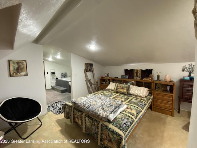 carpeted bedroom featuring recessed lighting and lofted ceiling