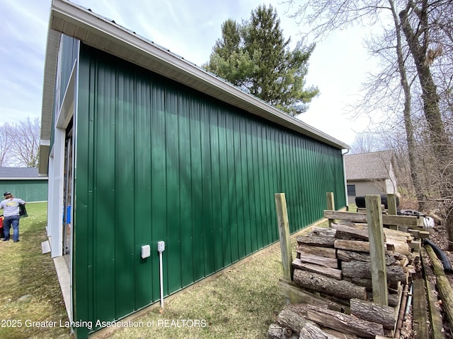 view of home's exterior featuring an outdoor structure