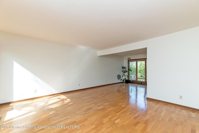 1210 Whittier Dr, East Lansing, MI 48823 - unfurnished room featuring light wood-type flooring and baseboards