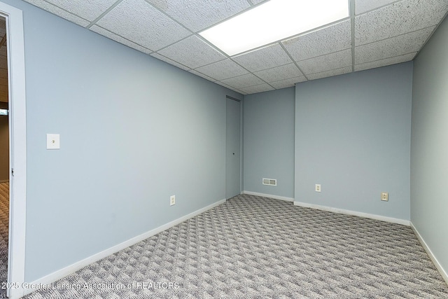 1210 Whittier Dr, East Lansing, MI 48823 - carpeted empty room featuring baseboards, a drop ceiling, and visible vents
