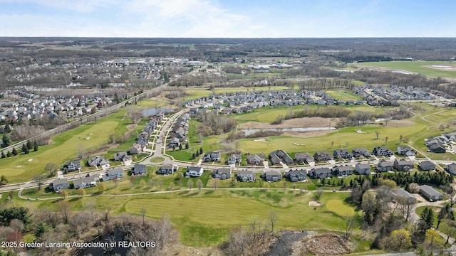 bird's eye view featuring a water view, a residential view, and view of golf course