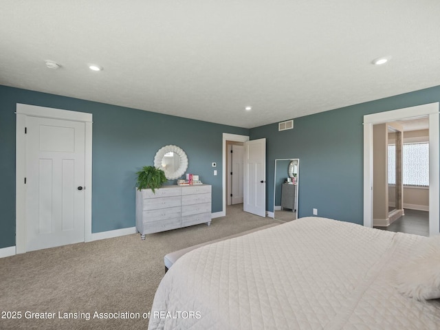 carpeted bedroom with baseboards, visible vents, and recessed lighting