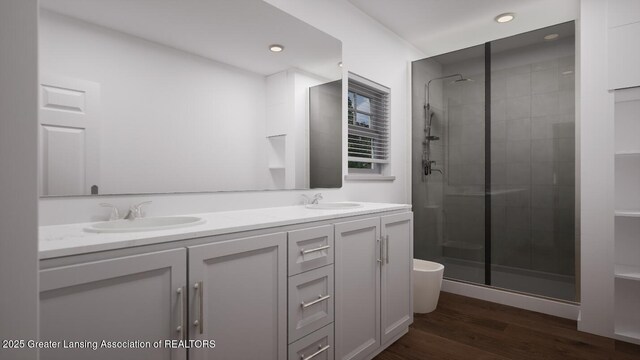 2188 Selah Way, Fennville, MI 49408 - full bathroom featuring a sink, double vanity, a stall shower, and wood finished floors