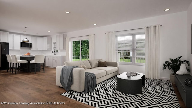 2188 Selah Way, Fennville, MI 49408 - living room featuring wood finished floors and recessed lighting