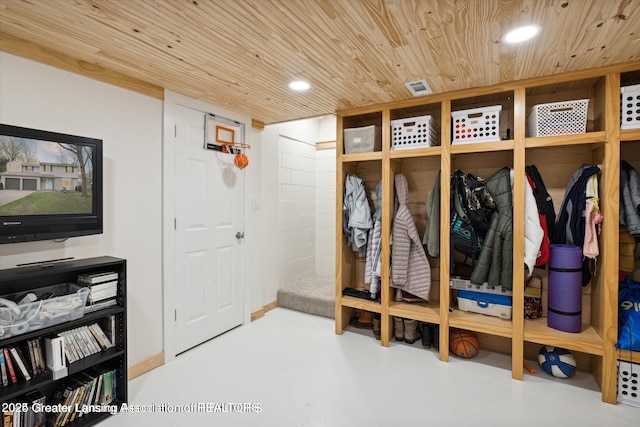 mudroom with wooden ceiling, recessed lighting, and concrete floors