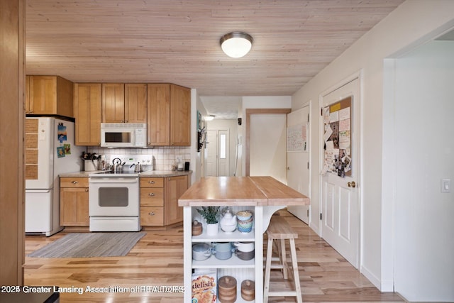 kitchen featuring wooden ceiling, decorative backsplash, light wood finished floors, and white appliances