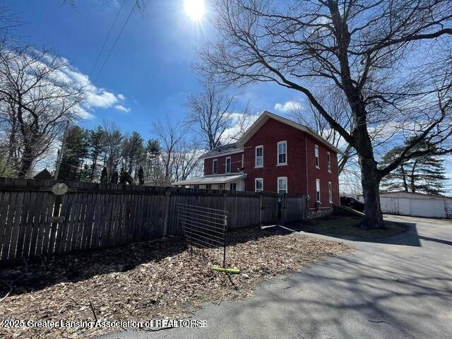 11100 Anderson Rd, Litchfield, MI 49252 - view of side of property featuring fence