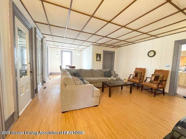 11100 Anderson Rd, Litchfield, MI 49252 - living room with light wood-style floors
