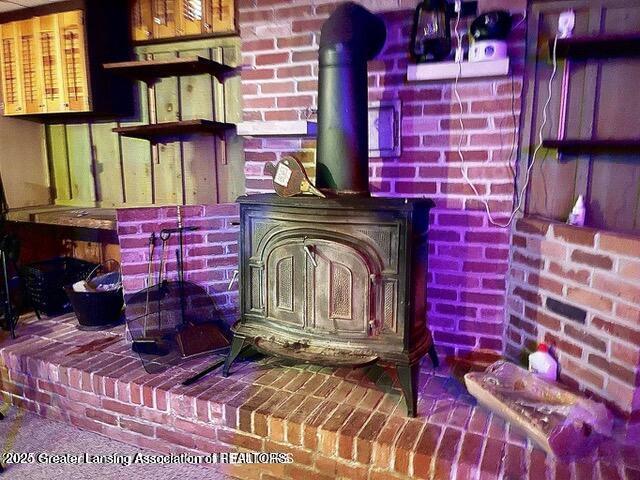 11100 Anderson Rd, Litchfield, MI 49252 - detailed view of a wood stove