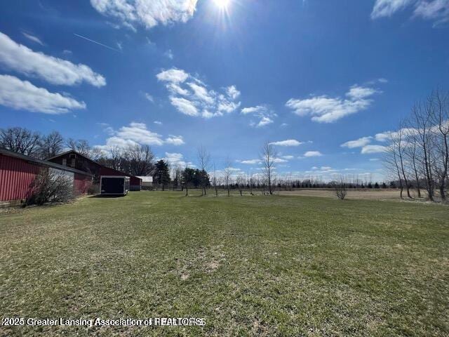 11100 Anderson Rd, Litchfield, MI 49252 - view of grassy yard featuring an outbuilding