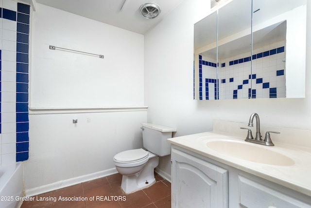 5026 Delray Dr, Lansing, MI 48910 - full bathroom with vanity, baseboards, tile patterned floors, toilet, and visible vents