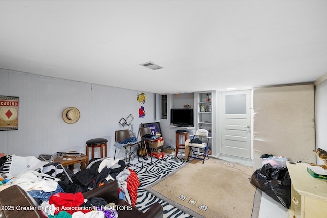 610 Spokane Ave, Lansing, MI 48910 - living room featuring concrete flooring