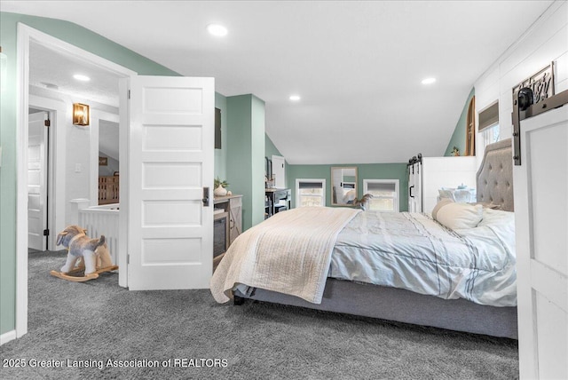bedroom with recessed lighting, lofted ceiling, and carpet floors