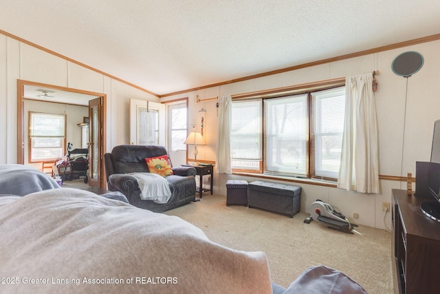 living room featuring carpet, vaulted ceiling, and crown molding
