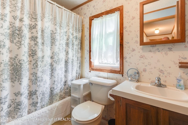 bathroom with vanity, wallpapered walls, shower / bath combo, crown molding, and toilet