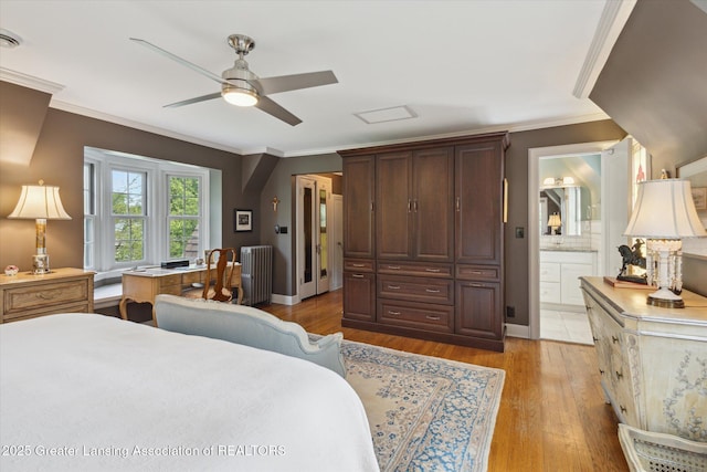 728 Audubon Rd, East Lansing, MI 48823 - bedroom featuring radiator, crown molding, light wood-type flooring, ensuite bath, and a ceiling fan
