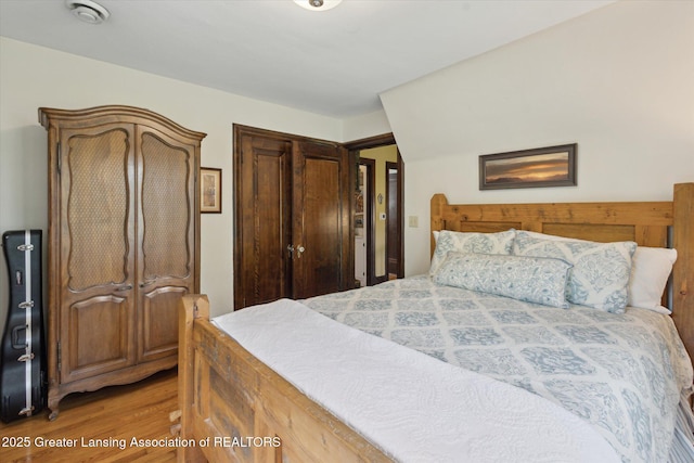 728 Audubon Rd, East Lansing, MI 48823 - bedroom with light wood-type flooring