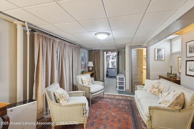 728 Audubon Rd, East Lansing, MI 48823 - living room featuring a drop ceiling