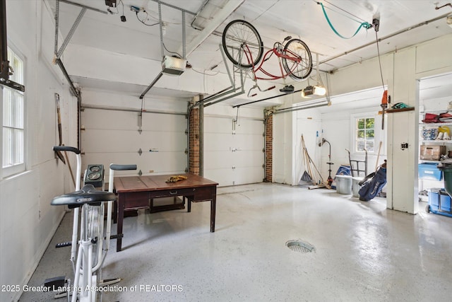 728 Audubon Rd, East Lansing, MI 48823 - garage with a garage door opener
